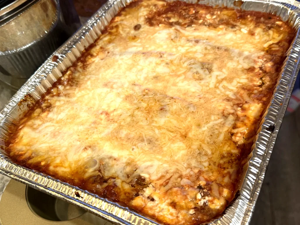 Cabin & Crumb lasagna fresh out of the oven with melted cheese